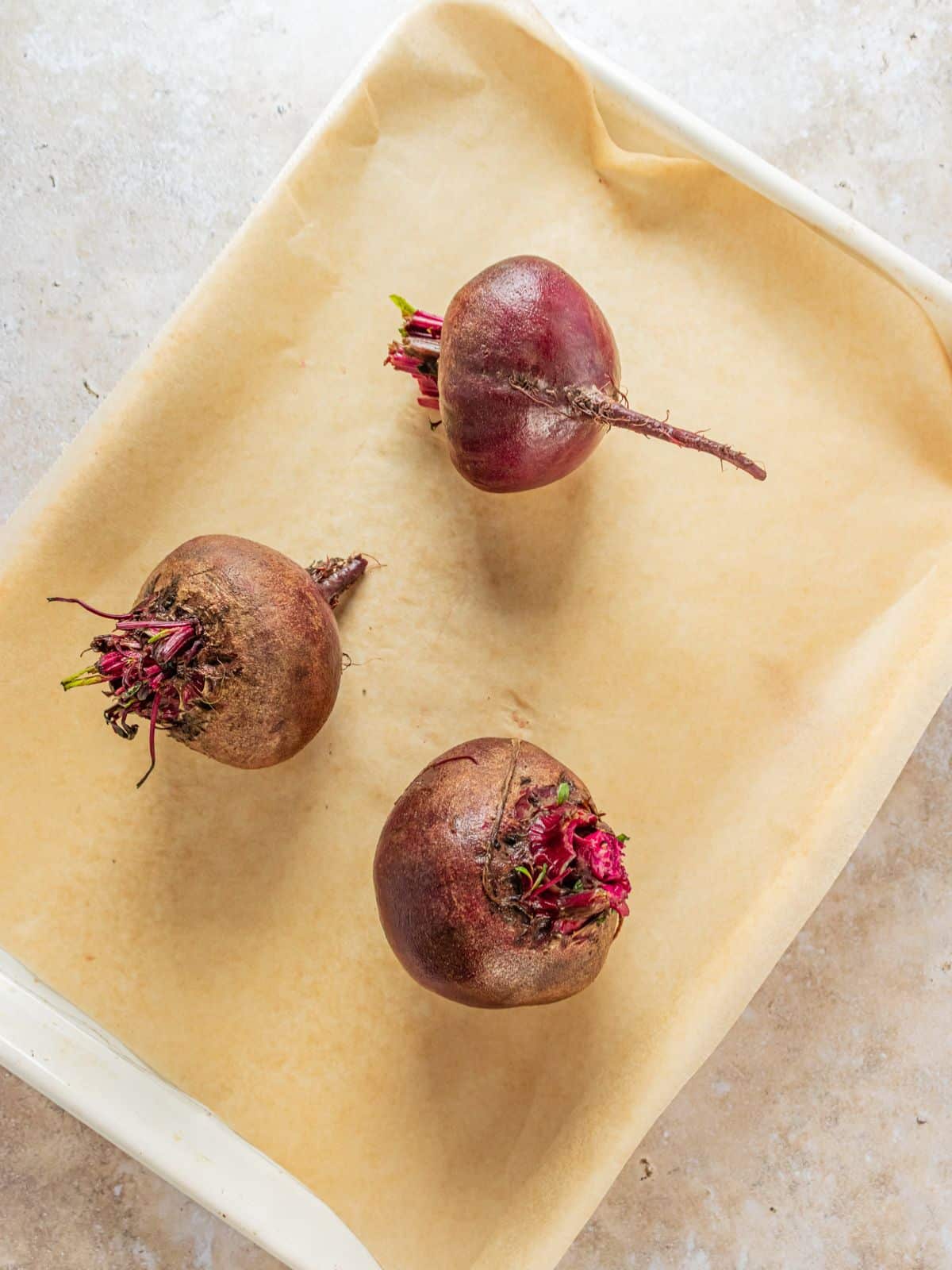 Beets on a baking sheet to roast.