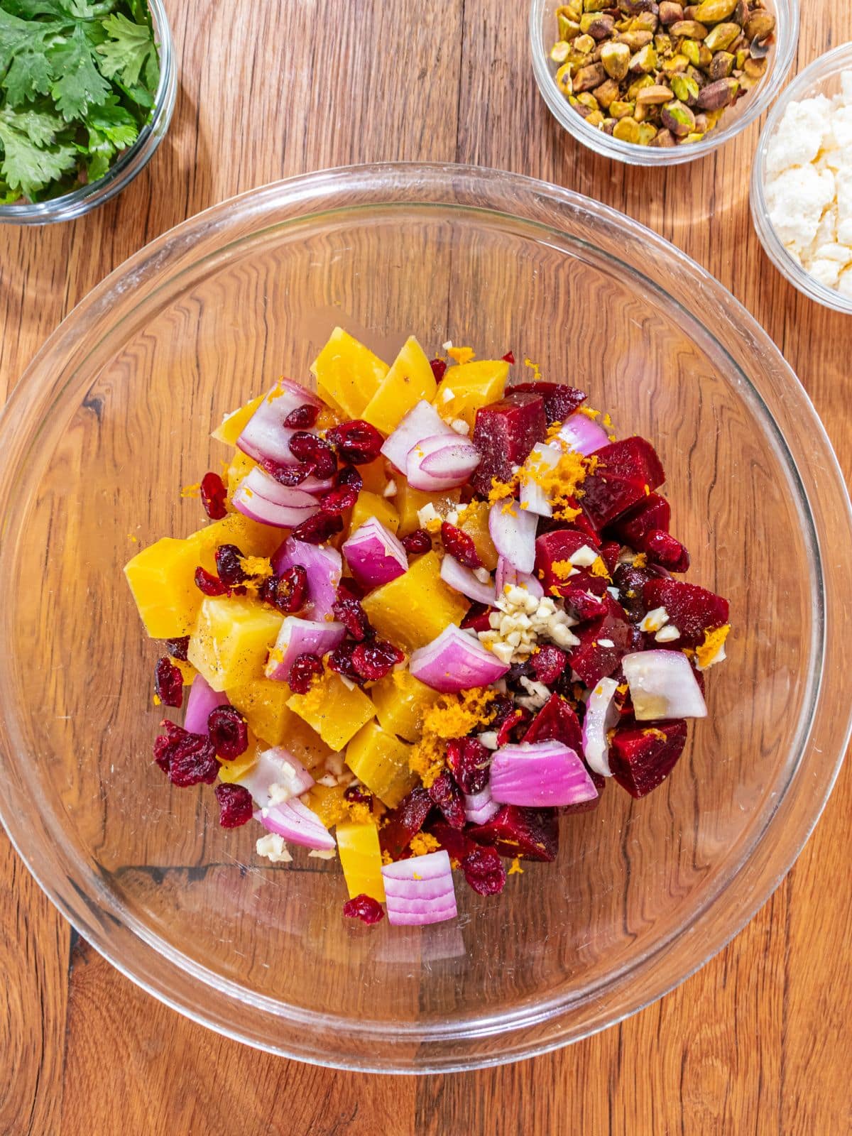 Onion, garlic, olive oil, vinegar, orange juice, zest, craisins, salt and pepper mixed into the beets.
