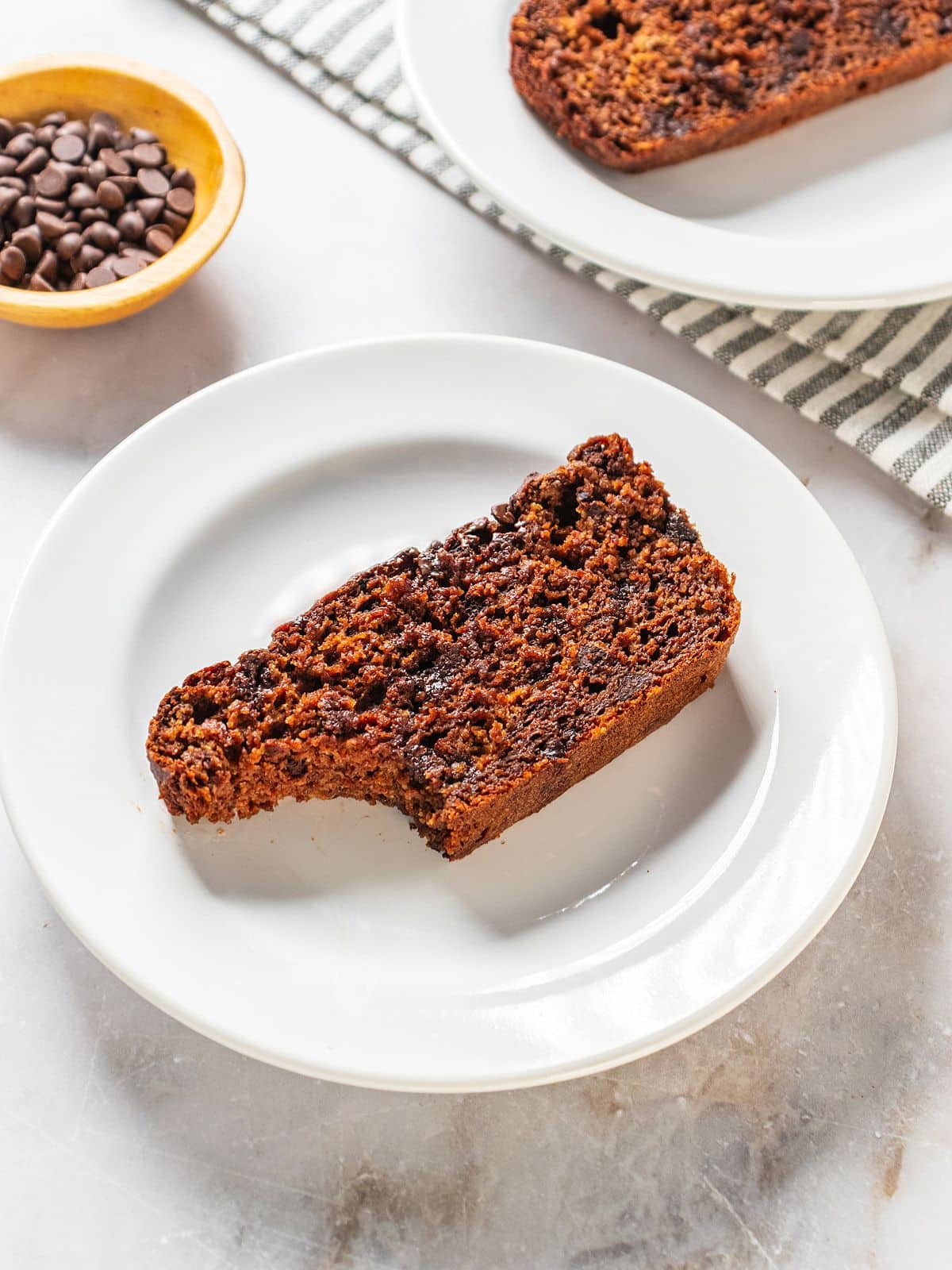 A slice of butternut squash bread on a plate.