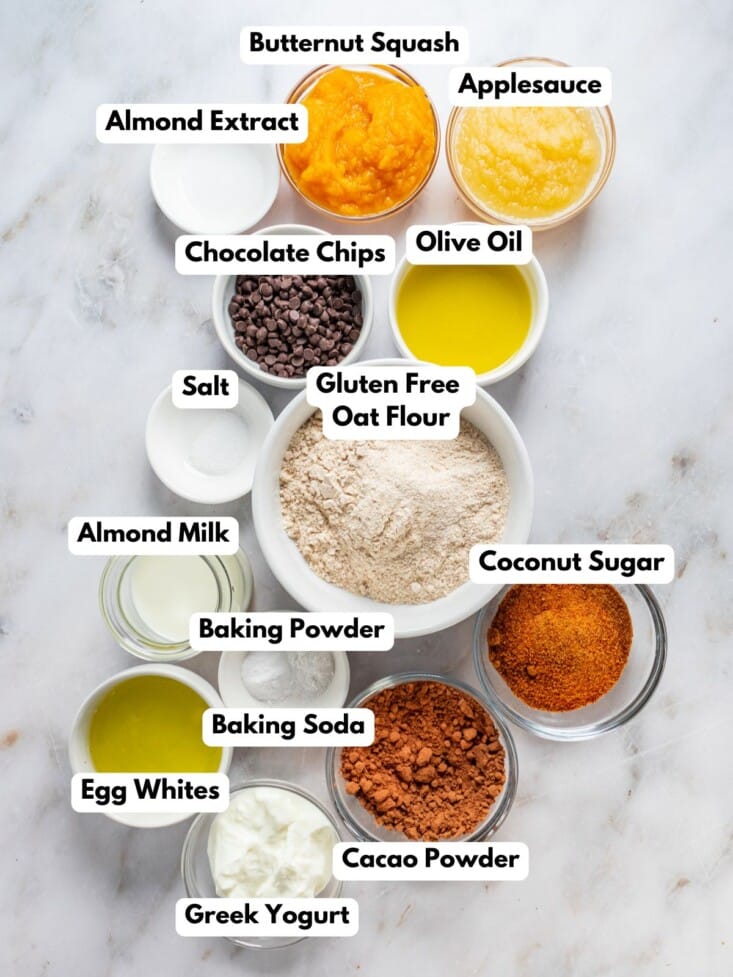 Ingredients to make this bread in bowls on a table.