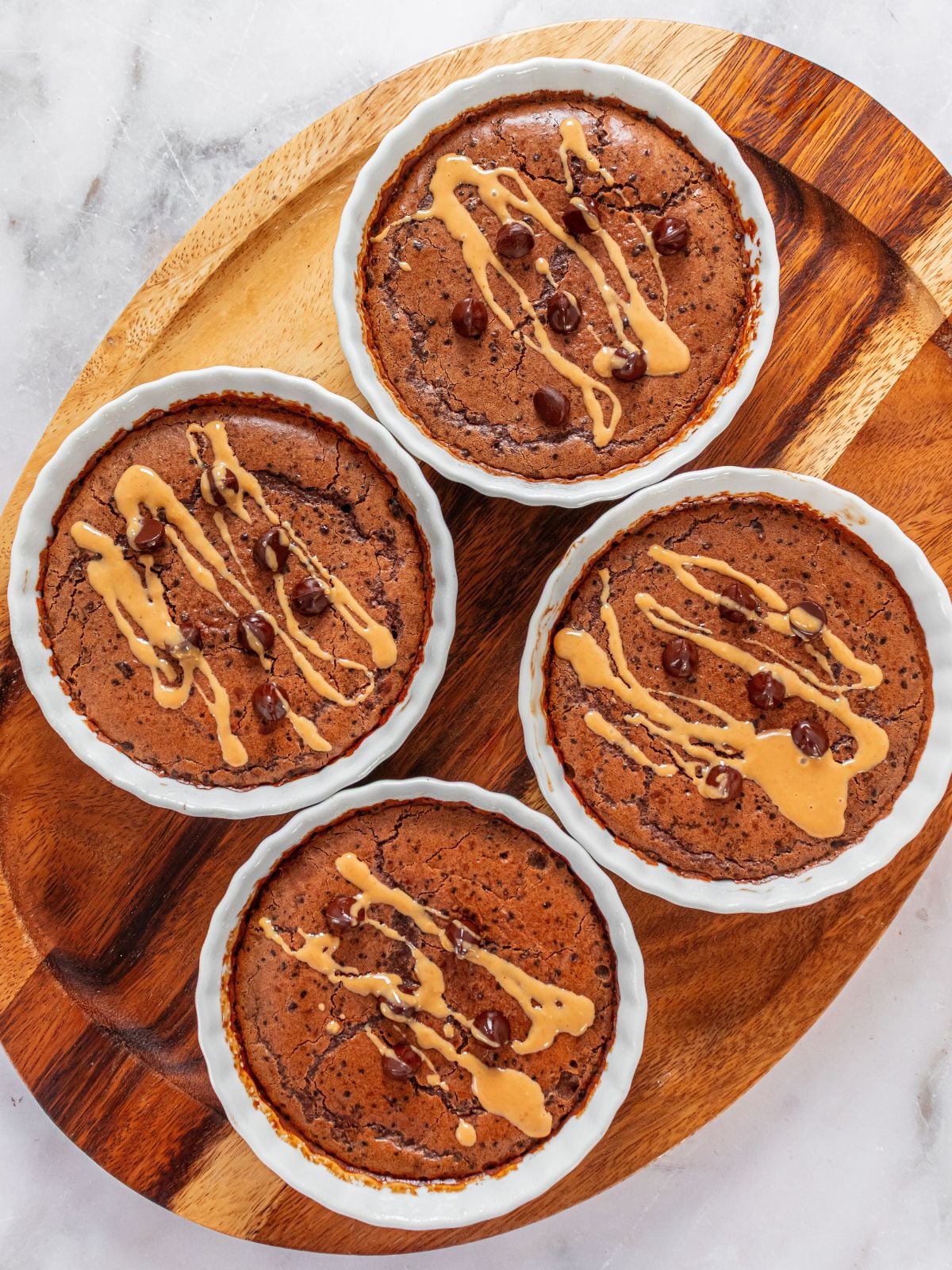 The mug cakes cooled and toppings added.