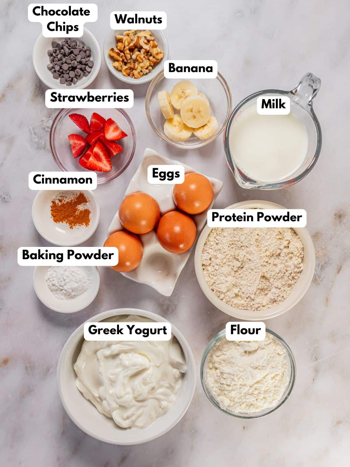 Ingredients to make meal prep pancake bowls on a countertop.