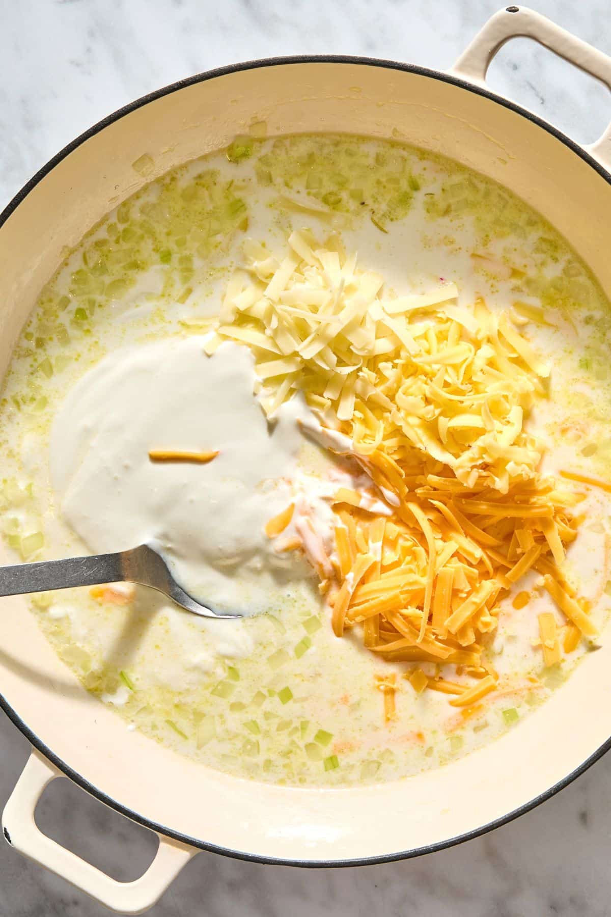 Cheeses added to the sauce.