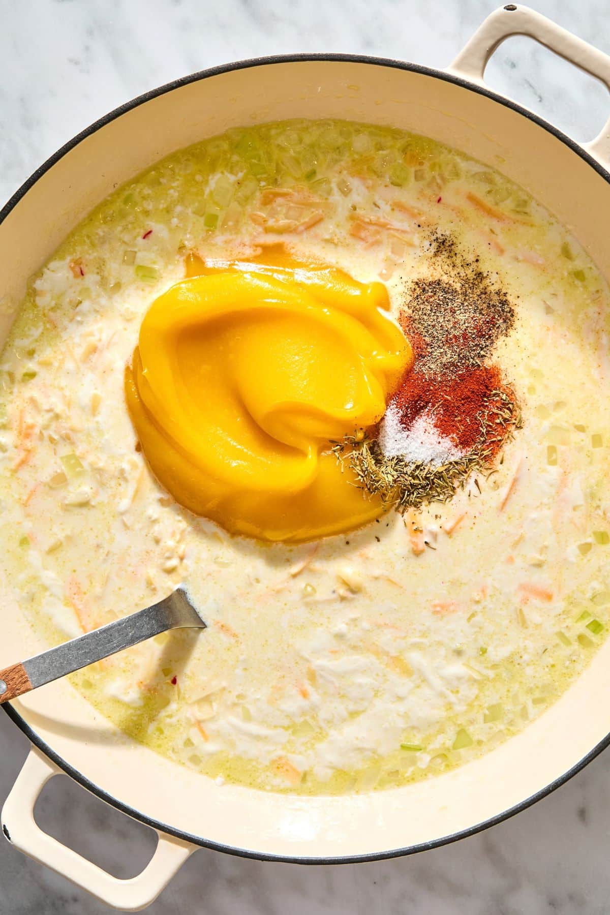 Butternut squash and seasonings added to the mac and cheese sauce.