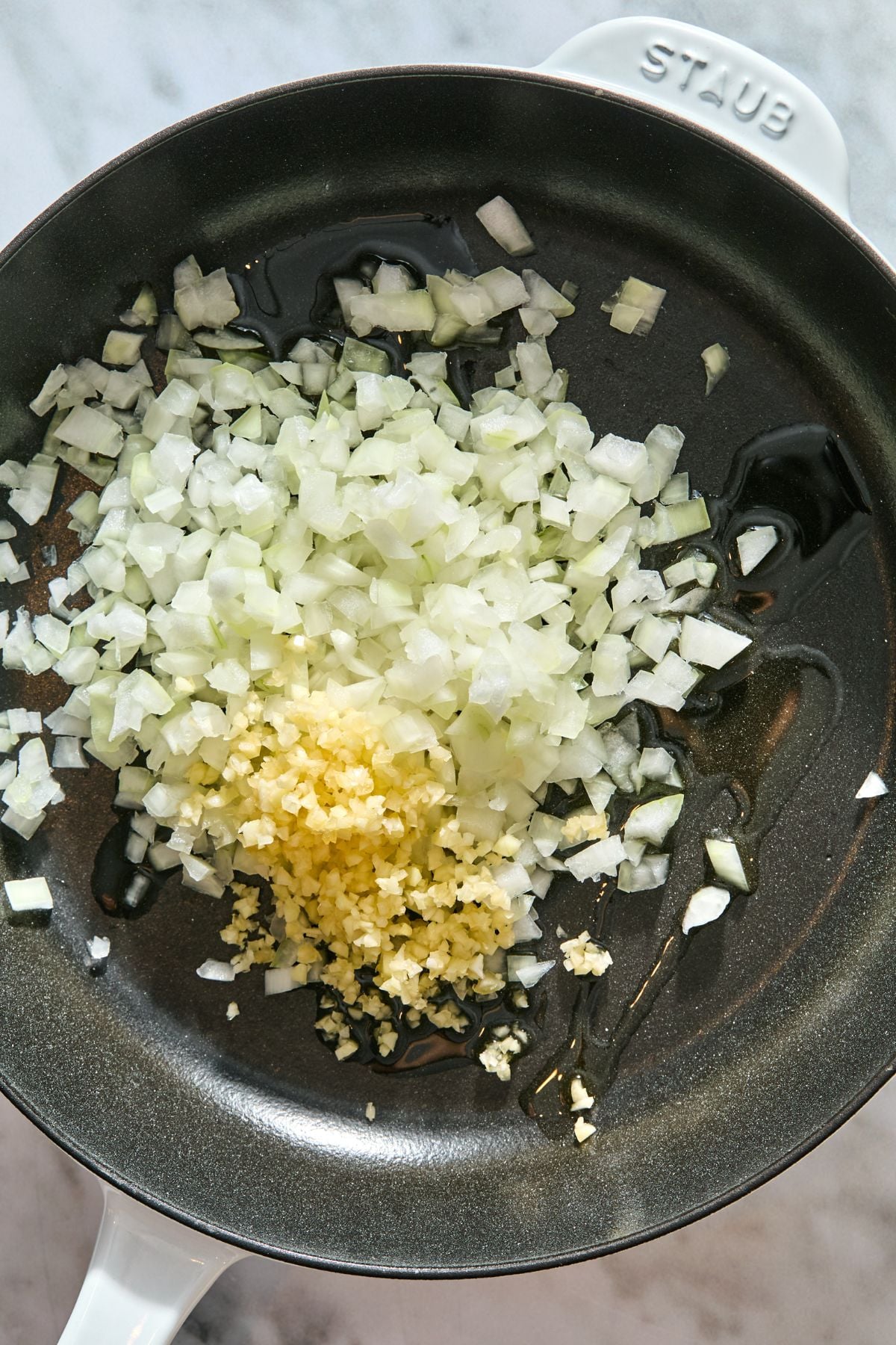Oil, onion and garlic in a skillet.