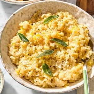 Butternut squash risotto with sage on top.